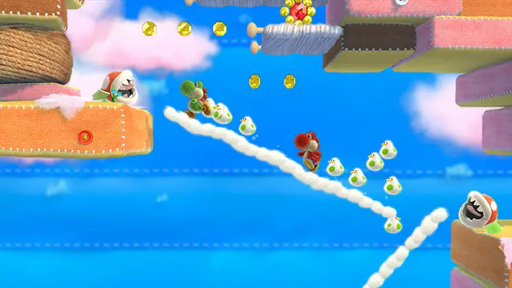 Yoshi navigating a windy section with moving platforms in 1-4: Bundled-Up Blowhards